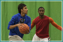 Two students playing basketball - the iSense can be adapted to all sports