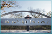 Registrar Bryn Morris at the entrance to the Knowledge Gateway