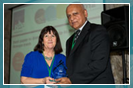 Professor Jay Mitra receiving one of his awards