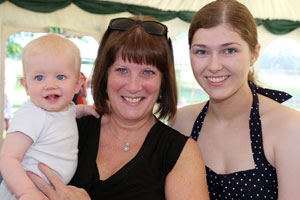Elaine Dixon with current and former nursery children
